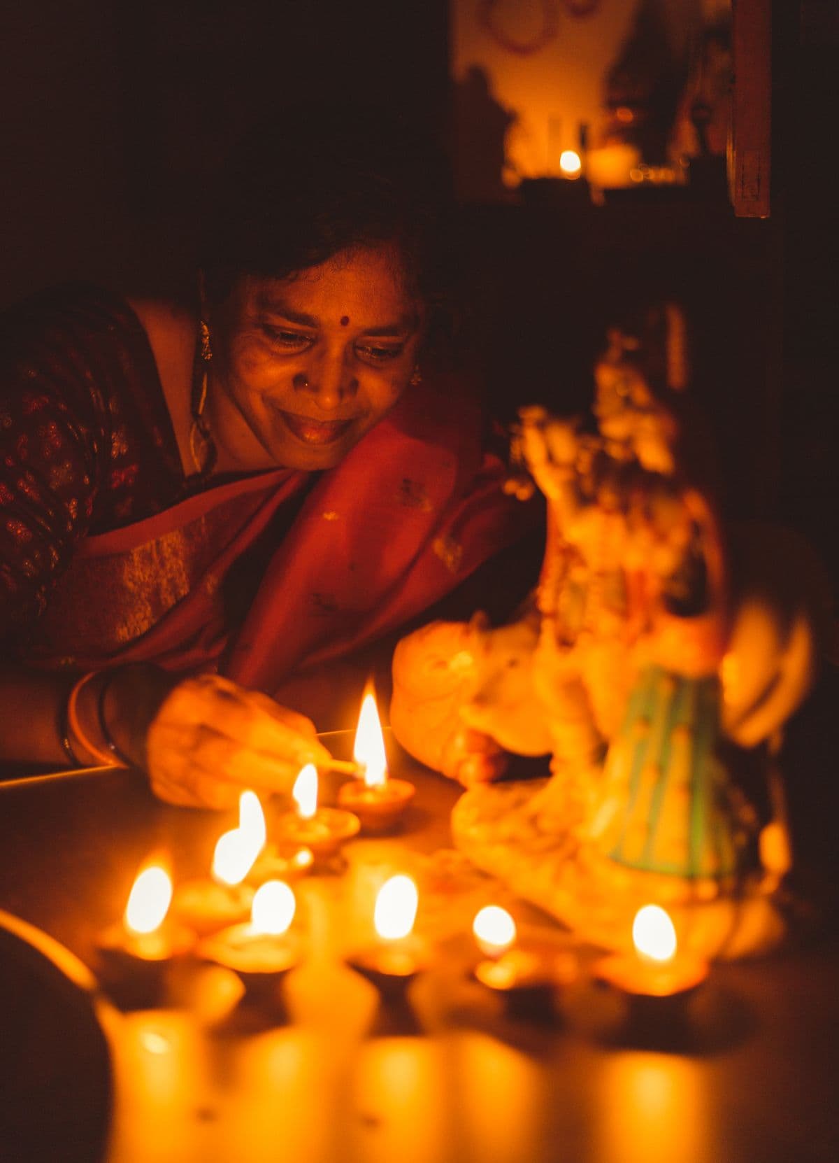 Traditional diya oil lamps lit for a Diwali celebration